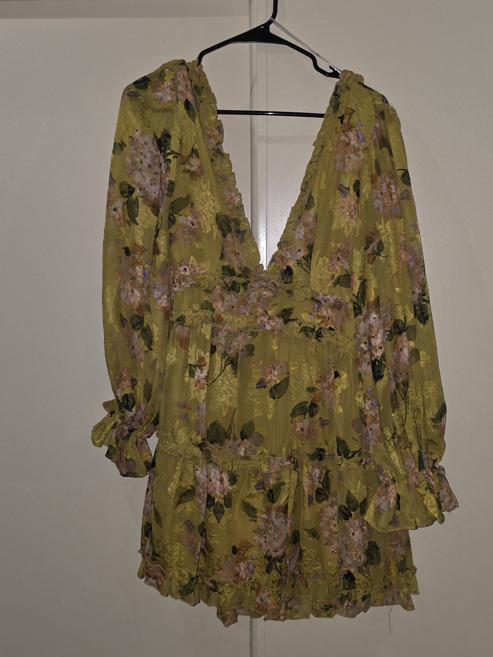 the clothing company Mustard Yellow Floral V-Neck Ruffle Dress